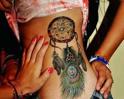 Tatuagem na barriga de filtro de sonhos femininos Tatuagem na barriga de filtro de sonhos femininos
